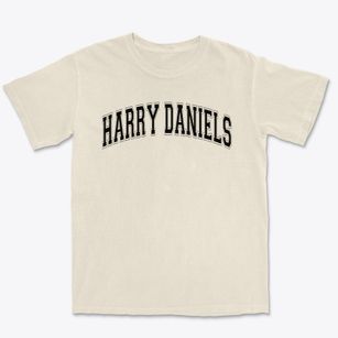 Harry Daniels Primary Center Varsity Arch Premium Heavyweight T-shirt